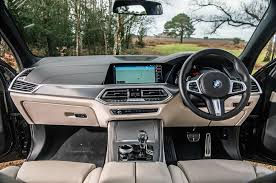 Bmw individual leather upholstery, heated and cooled cup holders, and a harman/kardon surround sound system are all available. Bmw X5 Interior Autocar