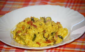 Risotto alla marinara, riso al nero di seppia, riso con piselli, riso con i porcini Risotto Con Zucchine Fiori Di Zucca E Speck