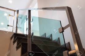 Learn how to build, handrailing and guardrails. Modern Minimalist Style Stairs With Brown Wooden And Steel Handrails Stock Photo Picture And Royalty Free Image Image 152228313