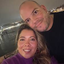 Adding recessed lights parallel to the dining table competing with the  chandelier?