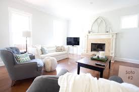 A living room layout where the fireplace is behind the sofa. Living Room Update Two Sofas It Is The Lettered Cottage