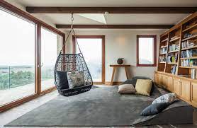 This farmhouse living room takes a simple approach, featuring wooden furniture and a warm leather couch. 15x20 Family Room Ideas Photos Houzz