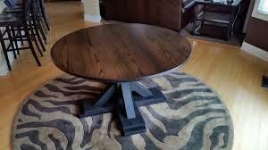 James James 54 Round X Base Table With A Top Stained In Kona And A Black Painted Base Customizable S Craftsman Dining Tables Furniture Solid Wood Furniture