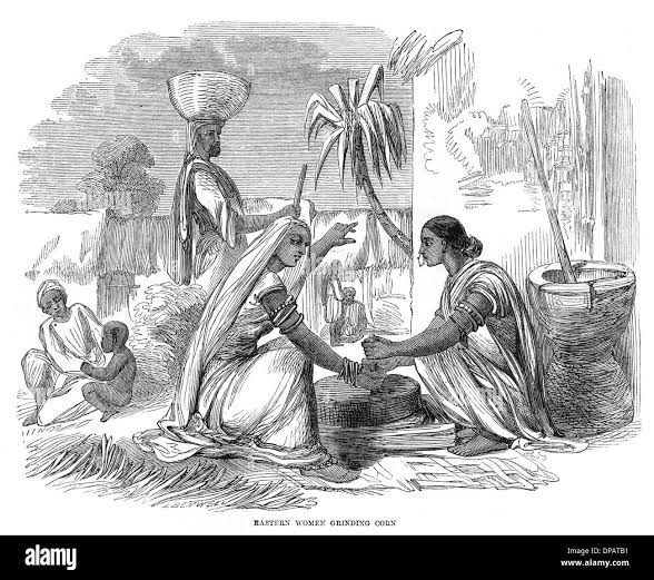Women grinding india Black and White Stock Photos & Images - Alamy
