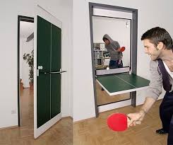 There S Now A Table Tennis Door That Folds Down Into A Ping Pong Table Ping Pong Table Space Saving Furniture Ping Pong