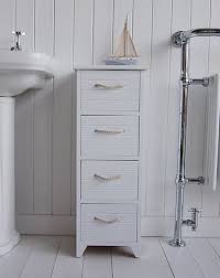 Corolla freestanding over the toilet bathroom space saver organizer with storage cabinet, adjustable shelf & open shelf, white & marble wood, contemporary. Slim Bathroom Cabinet With 4 Drawers And Towel Rail Freestanding Bathroom Furniture Freestanding Bathroom Cabinet White Bathroom Furniture