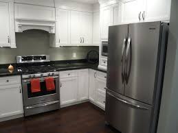 Either way love this design from. Kitchens Scotwend Homes Ltd Black Stainless Appliances White Cabinets With Granite New Kitchen Interior