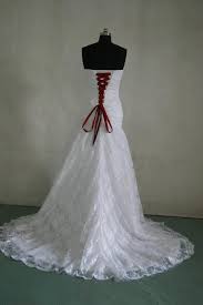 White Lace Wedding Gown With Apple Red Corset Lace Ups Red Wedding Dresses Making A Wedding Dress Wedding Dresses