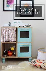 Remodelaholic Cute Easy Kids Play Kitchen From A Cube Shelf Diy Kids Kitchen Kids Play Kitchen Diy Play Kitchen