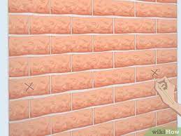 Master the art—and it is an art—of hanging garlands and tinsel on your christmas tree. 3 Simple Ways To Hang Garland On Brick Wikihow