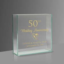 Another idea for 50th anniversary gifts is to make a collage of memorable photos. 50th Anniversary Personalized Modern Glass Vase