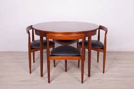 After wwii ships returned from asia with as much teak as they could, not wanting to return without goods. Teak Dining Table And Chairs