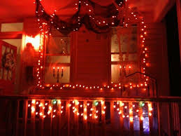 Getting The Front Porch Ready For Halloween Window Candelabra Lights From Target Hanging Black Gauze Spiderwe Halloween Window Hanging Ghosts Wreath Hanger