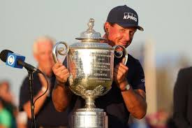 Amy was diagnosed with breast cancer 11 months before phil mickelson wears a hat with the breast cancer awareness ribbon during his practice round at the u.s. A Gl Osl0alskm