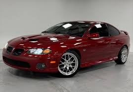 Image result for Electric Red 2005 Tiburon