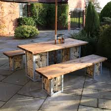 The chesterbrook collection brings the rustic indoor banquet style of dining to the outdoors. Outdoor Table Bench Set Gabion Range Woodberry