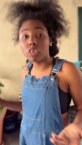 Grace is loving her new denim overalls. Tell us what you all think what  color should she pair with it? Any ideas? 💛🧡🩵💙🩷💜🩷 #tictokshopping  #overallsforgrace #overalls #specialneedspaenting #fypシ