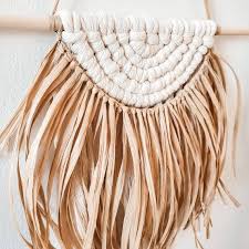 Make a macrame wall hanging to transform your home into the coziest place place in a modern bohemian chic style. Macrame Cotton Wall Suspension And Natural Raffia Boho Etsy Macrame Wall Hanging Macrame Wall Hanging Tutorial Boho Macrame Wall Hanging
