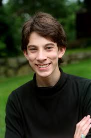 Young Champion is Brought to His Knees at Regis College