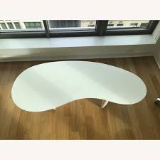 Cb2 Jelly Bean Coffee Table In White Aptdeco Cb2 white round table ✅.