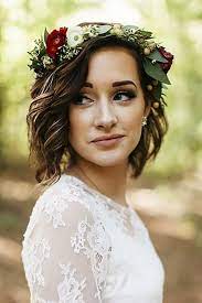 While ladies with long locks can easily achieve a different look with the help of it's a hairstyle that's been around for ages, but it continues to win over our hearts. Short Wedding Hairstyles With Flower Crown Flower Crown Hairstyle Short Wedding Hair Hair Styles