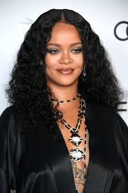 Black pixie haircut with curly hair. Rihanna S Changing Hairstyles Hair Colour A Timeline British Vogue