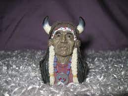 They appear to be made of concrete. Small Native American Indian Warrior Chief Figurine Wearing Bull Horn Headdress Native American Indians American Indians Bull Horns