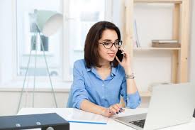 Apply to 9062 company secretary jobs across india on timesjobs.com. Free Photo A Young Brunette Girl Is Working At The Table In Office She Wears Blue Shirt And Black Glasses She Is Speaking On Phone