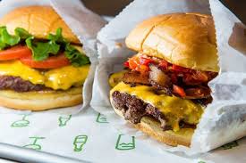 The company serves an american menu of burgers, chicken sandwiches, hot dogs, crinkle cut fries, shakes, frozen custard, beer and wine. Shake Shack