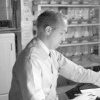 John H. Lawrence at desk, June 12, 1939. Cooksey 20 [Photographer: Donald  Cooksey]
