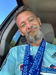 Eric Den Uyl never thought he'd run the length of Long Beach Island, never  mind do it just months after his mother, Claudia, lost her battle with  cancer. But there he was