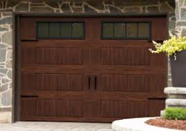 Garage doors come in glass, wood, and steel. Garage Doors Staining A Metal Door In A Woodgrain Finish Garaga