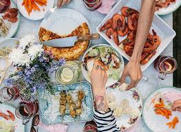 After learning how to make these mouth watering dishes, this video. Overhead View Of A Table Full Of Food With Hands By Kkgas Dinner Party Easy Healthy Dinners Fun Dinner Parties