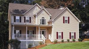Quite simply, vinyl provides more lasting protection for your home than any other home exterior materials. Light Tan Siding With Maroon Shutters House Paint Exterior House Exterior Insulated Siding