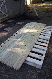 How To Build A Deck For Less Than 250 Pallet Patio Decks Diy Deck Pallet Deck Diy