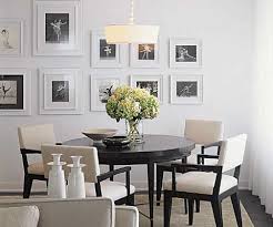 Haute High Rise Black Round Dining Table Cream Dining Chairs Contemporary Dining Room Design