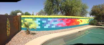 This might be a concept that rarely people use it. Spray Paint Brick Wall Brings Life To A Dull Brick Wall Next To Pool Paint Brick Wall Outdoor Paint Brick Wall