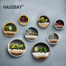 Para crear un ambiente de cuarto de las maravillas, añade un aparador de madera negra, unas campanas de vidrio, un jarrón de vidrio tintado. Encontrar Mas Jarrones Informacion Acerca De Pared De Hierro Creativo Flore Decoracion Con Plantas Artificiales Plantas En Pared Decoracion De Casa Con Plantas