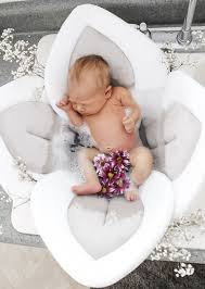 Forget about those hard plastic baby bath tubs or baby bath seats that are uncomfortable and don't cradle your child during bath time. Baby Bath Seat Baby Bath Tub Baby Bath Baby Bathtub Blooming Baby Bath Baby Bath Baby Bath Mats