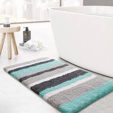 The bathroom is the perfect place to experiment with your home style, and bath mats and bathroom rugs are an easy, inexpensive way to play with pattern and color. Amazon Com Kmat Luxury Bathroom Rugs Bath Mat 20 X32 Non Slip Fluffy Soft Plush Microfiber Shower Carpet Rug Machine Washable Quick Dry Ultra Shaggy Bath Mats For Tub Bathroom And Shower Green Grey Kitchen Dining