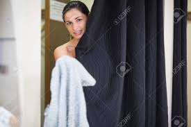 Visit www.sexywinkvideos.com for more fun videos and also send your videos to winkvideos@gmail.com for a chance to win different prizes thanks to our. Woman Standing Behind Curtain In Changing Room Holding Out Clothes Stock Photo Picture And Royalty Free Image Image 15593094