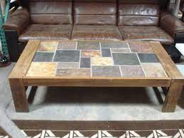 Find an old table, some cheap 16 cent tiles from home depot, and a permanent marker, and you can easily tile a table top. Heavy Wenge And Slate Tile Coffee Table Amsterdam Modern Coffee Table Slate Coffee Table Tiled Coffee Table