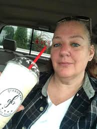 Iced coffee with 20 caramel pumps at drive thru window