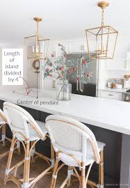 What height should i hang my pendant or chandelier from the ceiling? Height Spacing Of Pendant Lights Over A Kitchen Island My Must Have Tips Driven By Decor