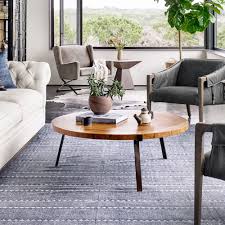 The round coffee table with ottoman seating can be an impressive looking coffee table that can make its owner very pleased. Natural Wood Round Coffee Table