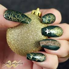 This manicure requires nothing but a metallic green polish, a. Sparkling Evergreen Stamped Christmas Nail Art With Opi