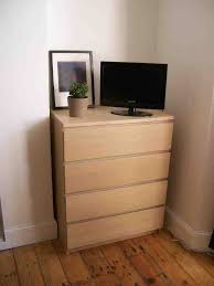 You'll definitely wanna read up on how this ikea hacker used spare carpet and a plastic bag to keep the wood from staining/rotting/whatever other terrible things happen when you mix wood with anything wet. Dresser To Be Located Opposite The Bed Mid Wall Ikea Hopen Corner Dresser Ikea Kullen Dresser