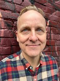 Poet returns to Surrey with 'A Bouquet Brought Back From Space' and other  stories in a life of writing