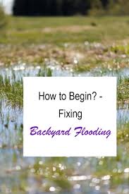 In other cases, the best way to redirect rainwater is to create a. How To Fix Backyard Flooding To Keep Your Yard Looking Spiffy 2021 Backyard Drainage Landscape Drainage Yard Drainage