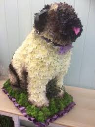 Maybe you would like to learn more about one of these? Val Spicer Designs On Twitter Animal Flower Arrangements Funeral Floral Funeral Flower Arrangements